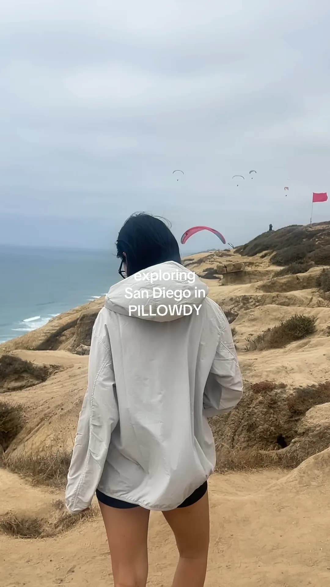 Creator exploring the coast in a Pillowdy jacket